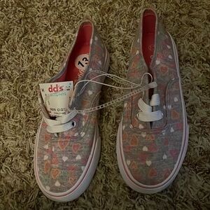 Size 13 girls tie shoes with hearts memory foam new with tags.